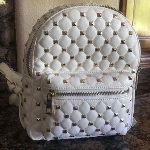 White studded backpack